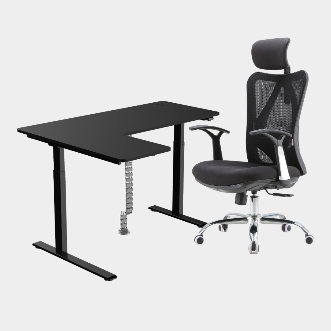 An L-shaped height-adjustable desk with a black tabletop and black legs, with grey cable management and chair viewed from a front angle against a white background.
