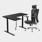 An L-shaped height-adjustable desk with a black tabletop and black legs, with grey cable management and chair viewed from a front angle against a white background.
