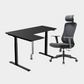 An L-shaped height-adjustable desk with a black tabletop and black legs, with grey cable management and chair viewed from a front angle against a white background.