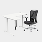 An L-shaped height-adjustable desk with a white tabletop and white legs, with grey cable management and chair viewed from a front angle against a white background.