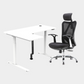 An L-shaped height-adjustable desk with a white tabletop and white legs, with grey cable management and chair viewed from a front angle against a white background.