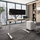 image of height adjustable desk with beige table op and white leg in home office with sky scrapper buildings in background