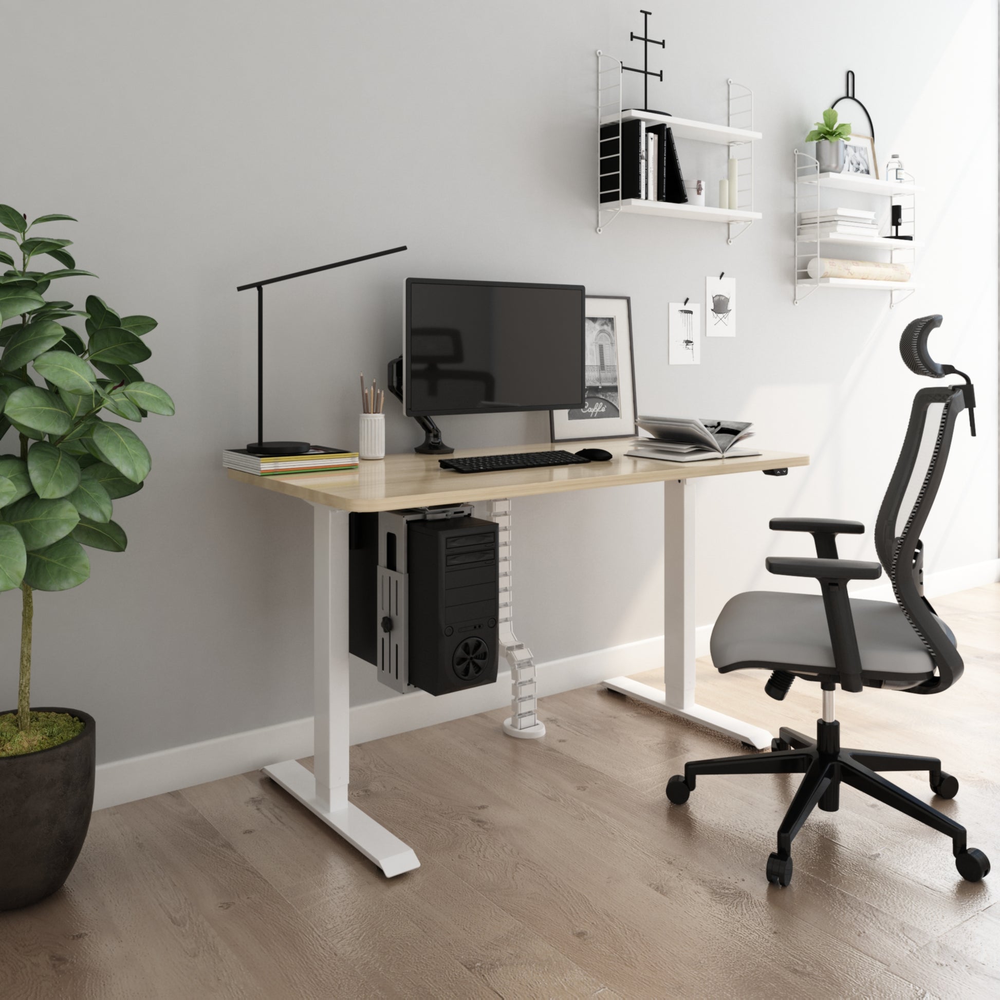 heritage height adjustable table with beige table top and white frame illustrated in a home office with some plants and shelves