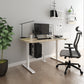 heritage height adjustable table with beige table top and white frame illustrated in a home office with some plants and shelves