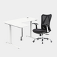 An L-shaped height-adjustable desk with a white tabletop and white legs, with grey cable management and chair viewed from a front angle against a white background.