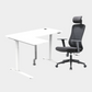 An L-shaped height-adjustable desk with a white tabletop and white legs, with grey cable management and chair viewed from a front angle against a white background.